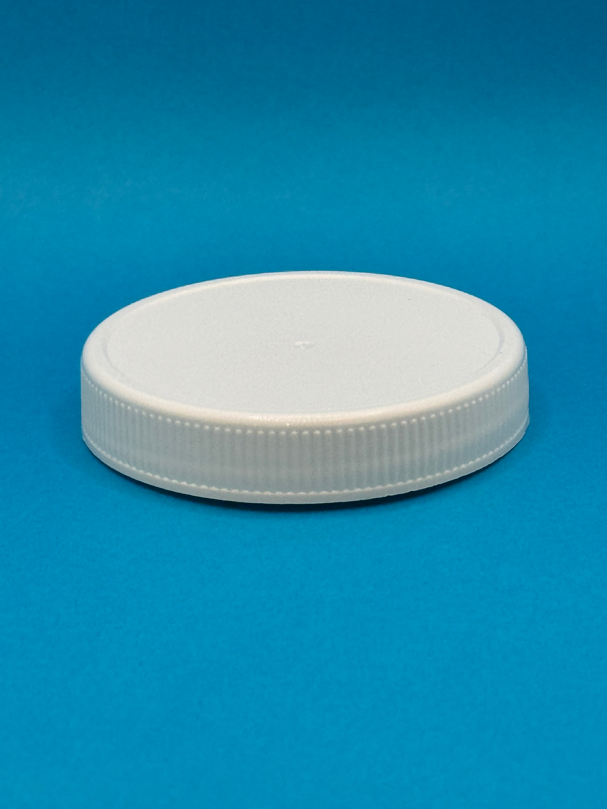 58-400 ($0.23/Each) Un-lined White Polypropylene Cap (CS/600)