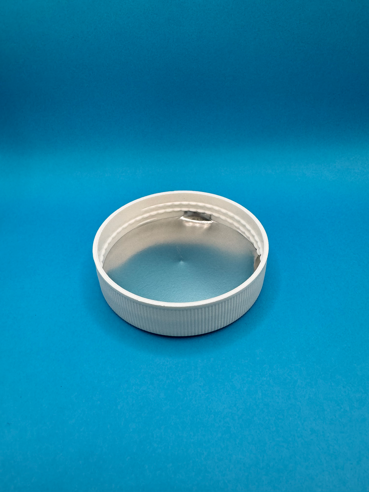 70-400 ($0.30/Each) HIS (Foil) Lined White Polypropylene Cap (CS/600)