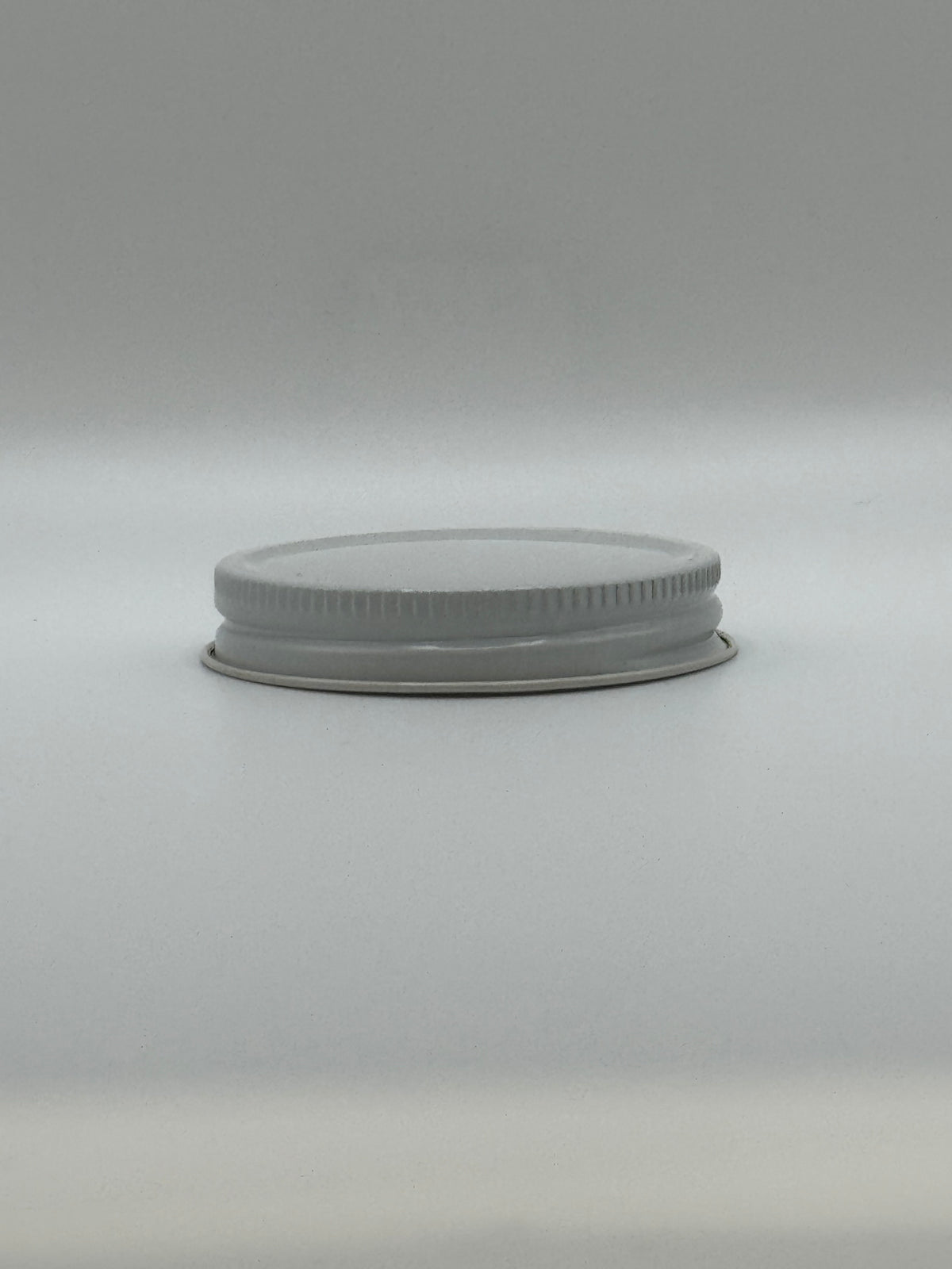 ($0.50/Each) - 58-400 White Metal Plastisol-Lined Cap (CS/600)